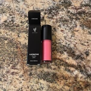 Younique Lucrative Lipgloss in the color Lonesome